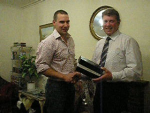 Photos of David Jane and George Knox receiving their awards from Chairman John Smithson