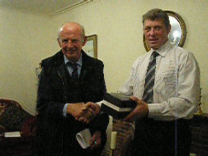 Photos of David Jane and George Knox receiving their awards from Chairman John Smithson